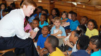 Commissioner Adam Putnam reading during Ag Lit Day