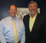 Congressman Ted Yoho (left) and Gary Cooper. Note the painting of Florida cattle on Yoho's Washington D. C. office wall in the background!