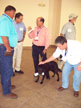 Pepe Peruyero, center, and his canker-detecting dog attract attention.